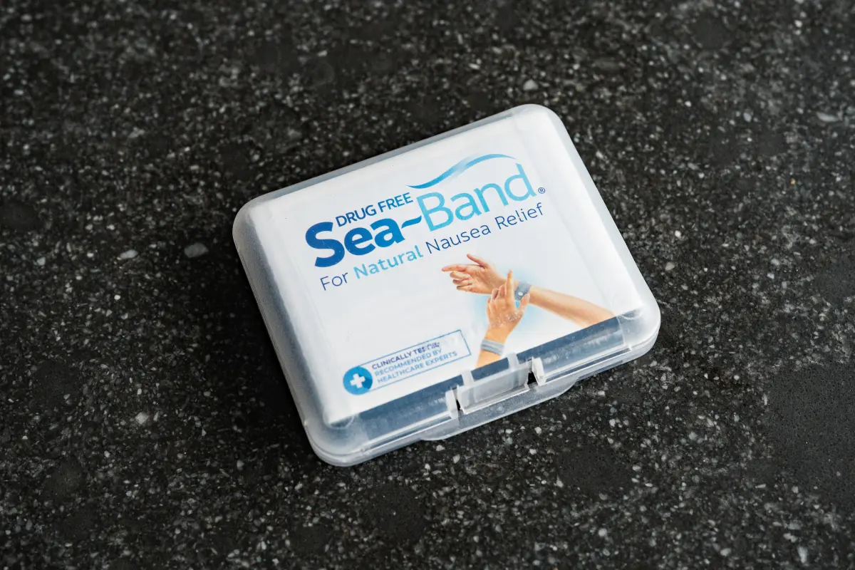 Sea sickness band case on a black background