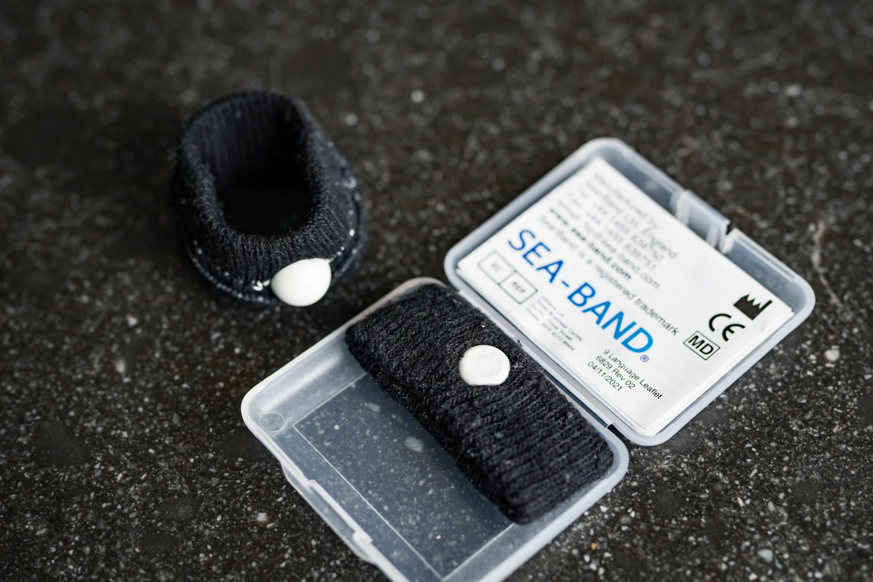 Sea Sickness Band case open showing band inside and outside